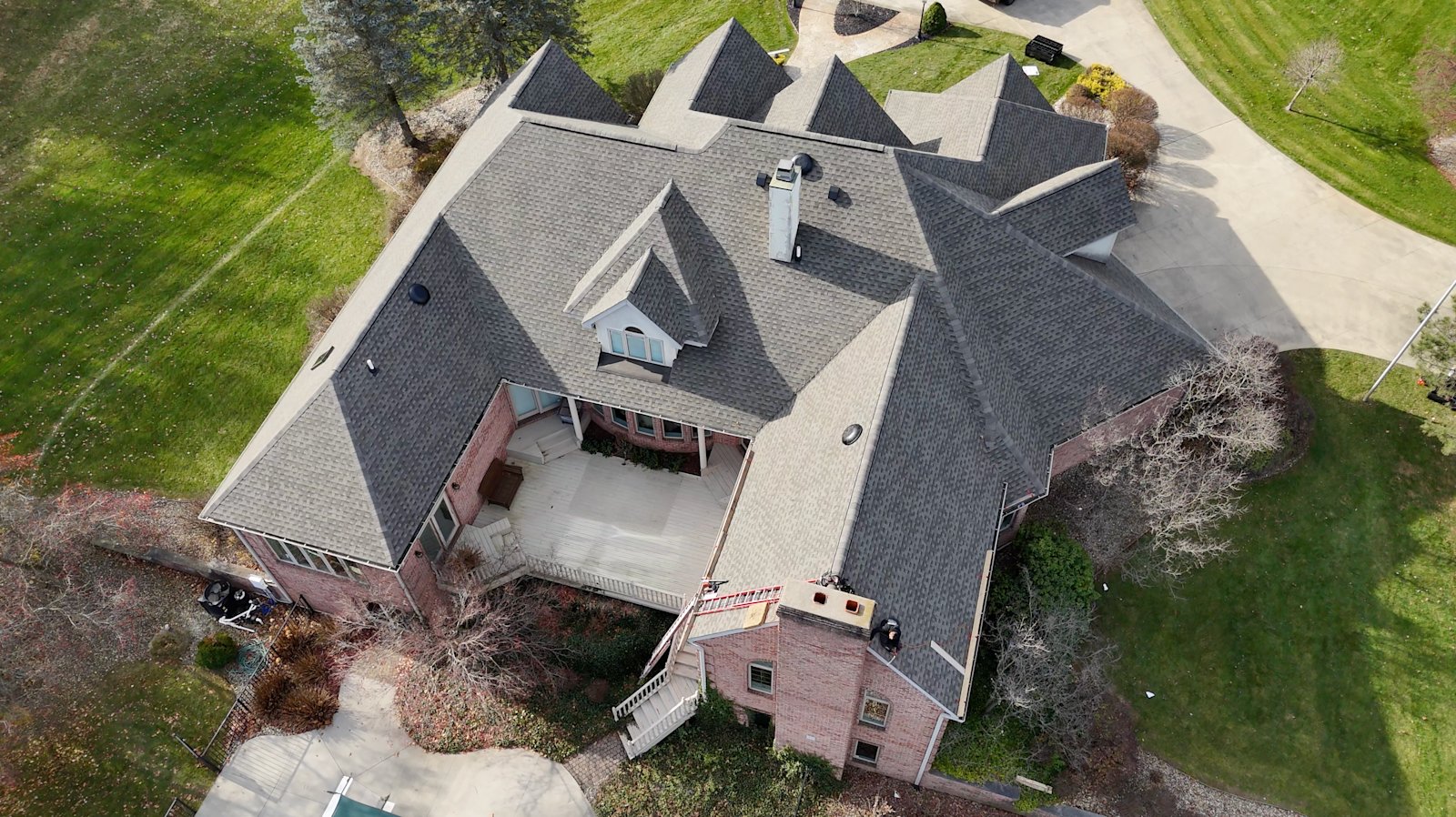 Aerial view of a completed residential roof replacement