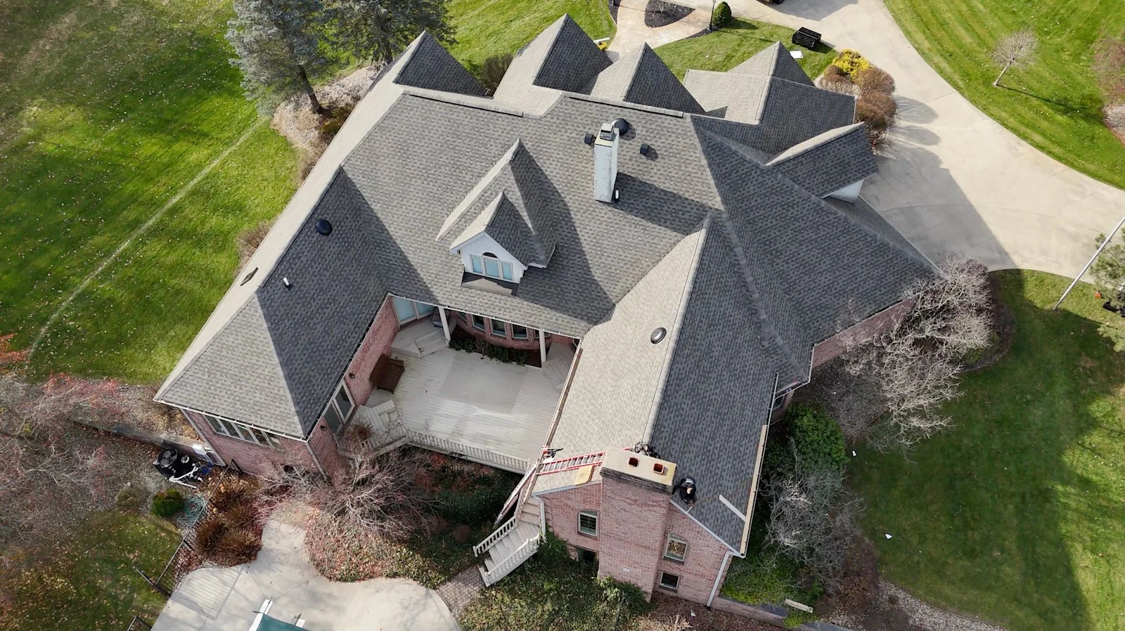 Aerial view of a completed residential roof replacement
