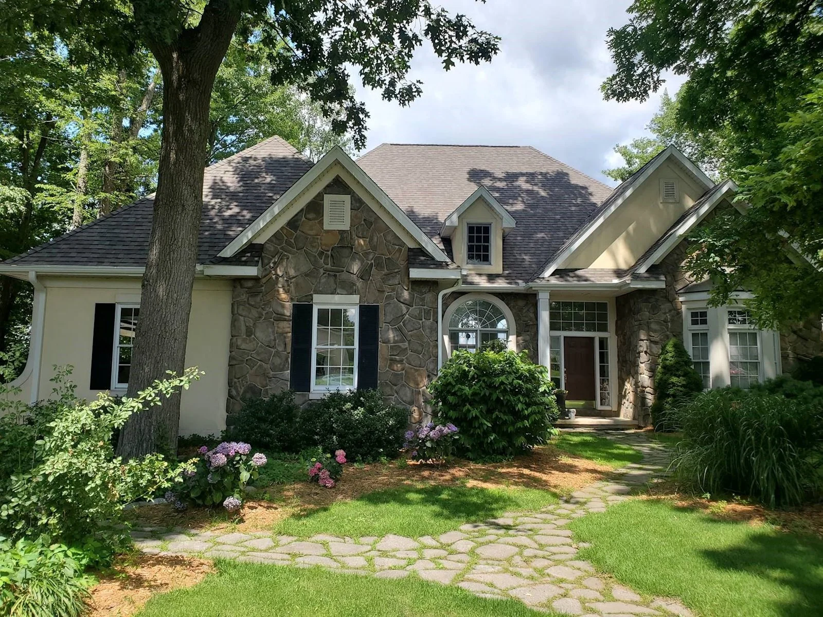 Completed roofing and exterior project on a Michigan home