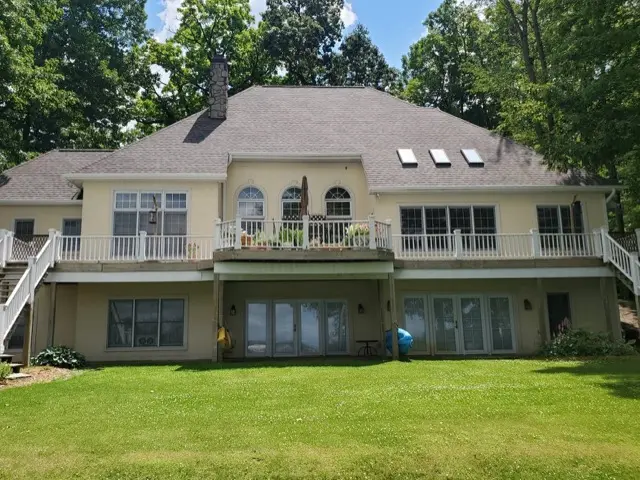 Rear exterior of a completed residential roofing project