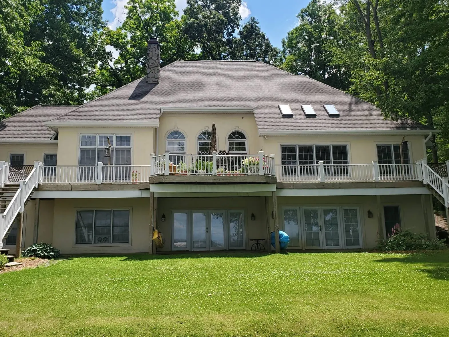 Rear exterior of a completed residential roofing project